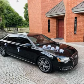Wynajem samochodu do ślubu Audi A8L limuzyna z kierowcą