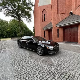 Wynajem samochodu do ślubu Audi A8L limuzyna z kierowcą