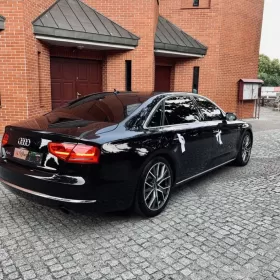 Wynajem samochodu do ślubu Audi A8L limuzyna z kierowcą