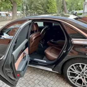 Wynajem samochodu do ślubu Audi A8L limuzyna z kierowcą