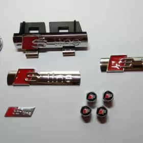 emblematy sline audi mega zestaw grill brelok nakrętki mat i połysk
